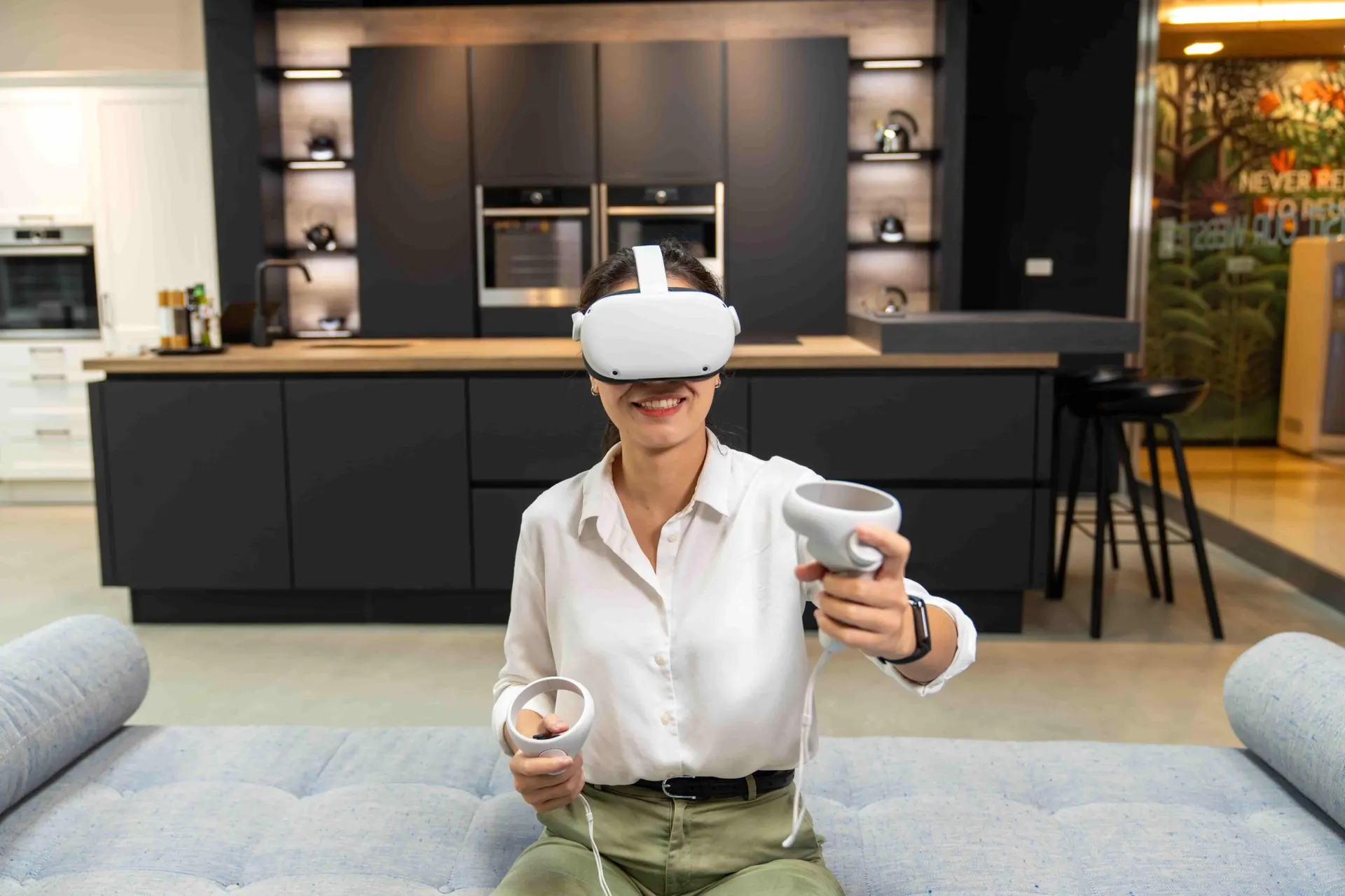 Experiencing a kitchen design in virtual reality at the Bangkok showroom