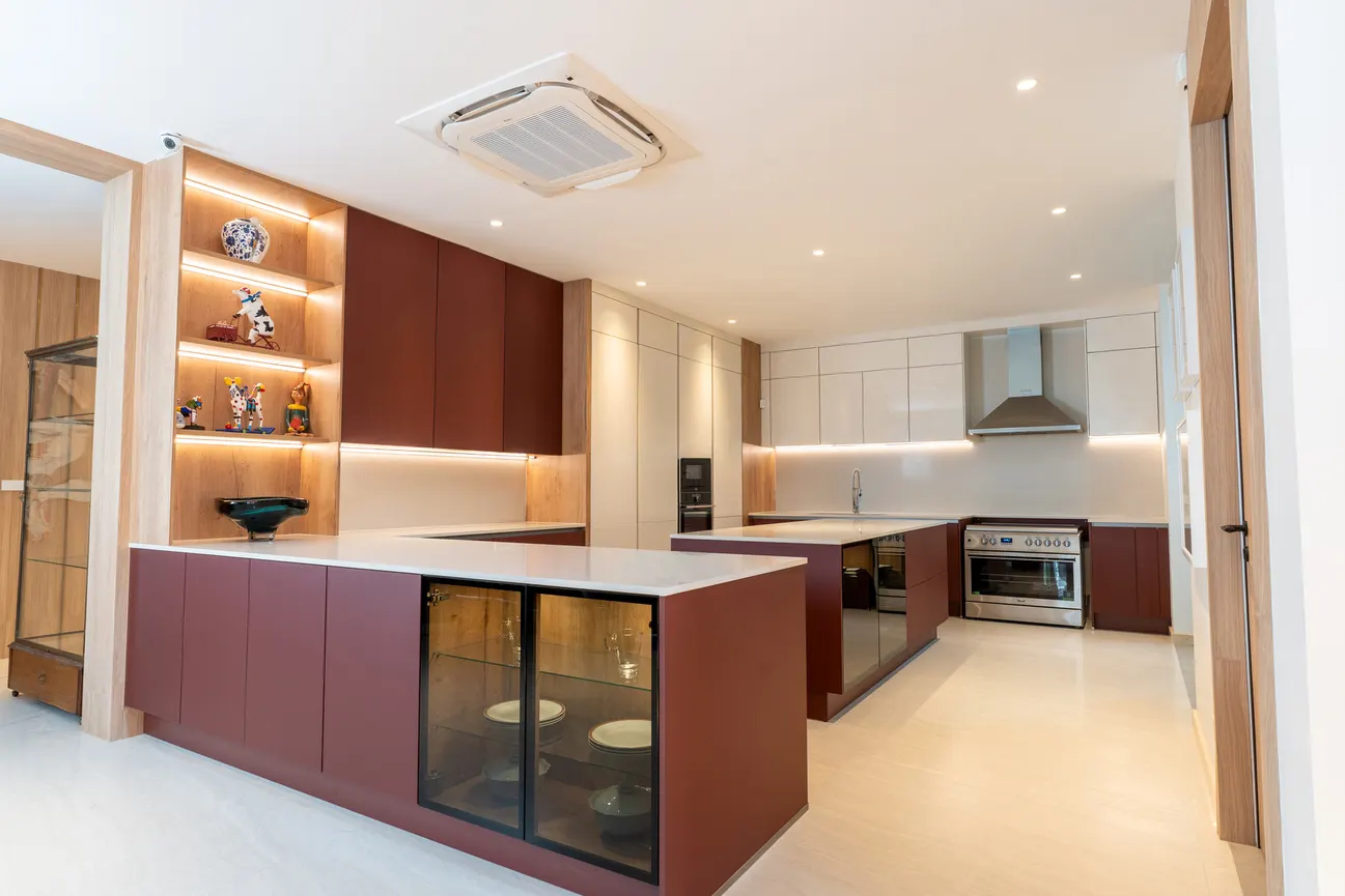 Bold show kitchen designed as a social hub for an art collector